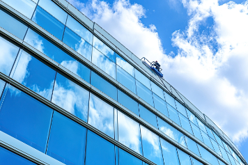Clean commercial building windows after professional cleaning